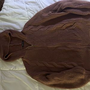 Dusty pink colored sweater zip up.